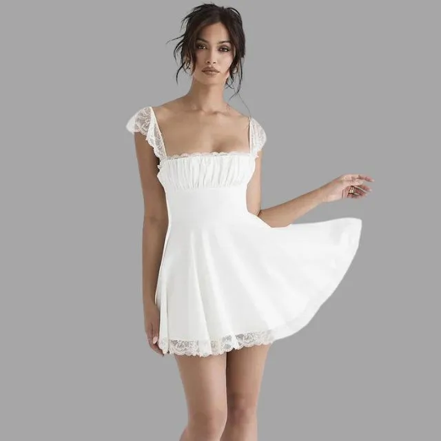 Evelina - Robe avec garniture en dentelle et jupe fluide