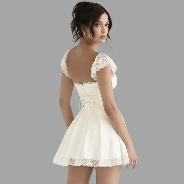 Evelina - Robe avec garniture en dentelle et jupe fluide